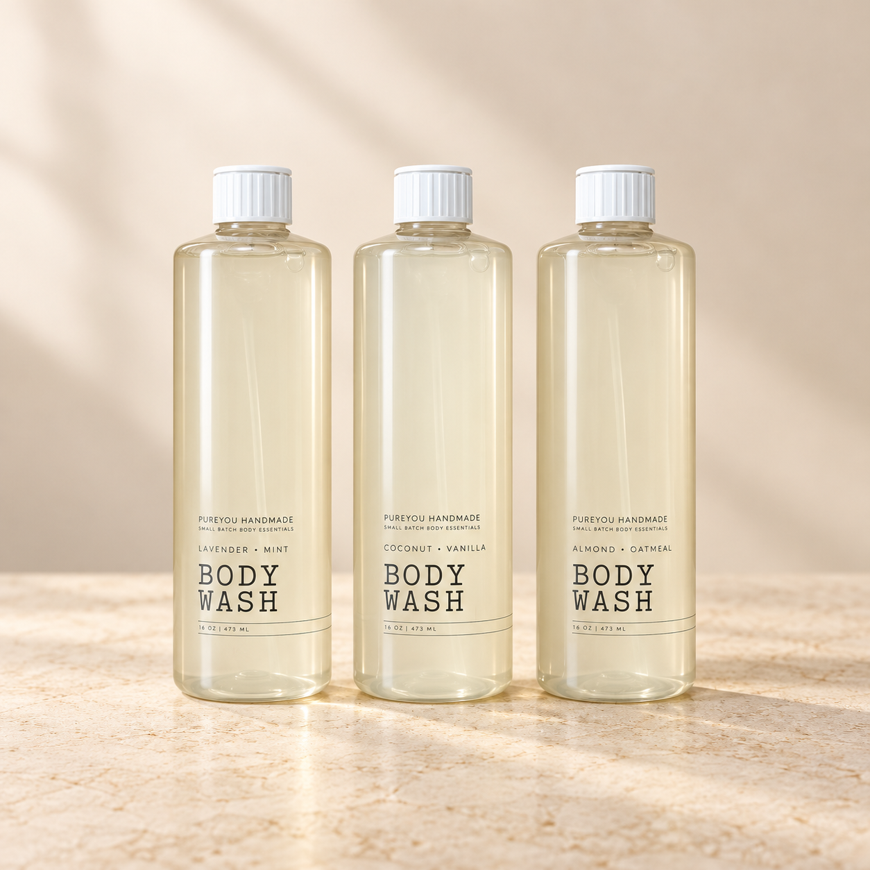 Three PureYou Handmade 16 oz body washes: Lavender Mint, Coconut Vanilla, and Almond Oatmeal